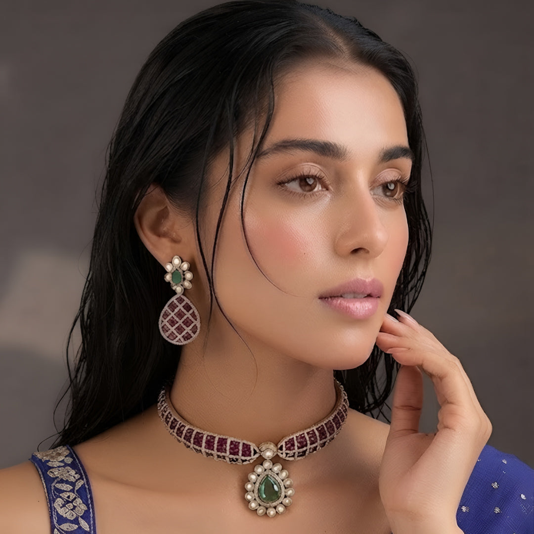 "Antique gold rigid choker necklace with ruby pavé lattice design and emerald pear pendant, matching earrings"