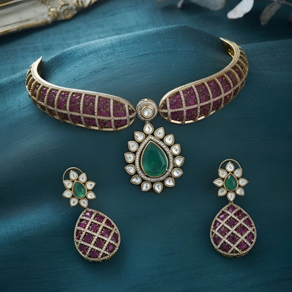 "Antique gold rigid choker necklace with ruby pavé lattice design and emerald pear pendant, matching earrings"