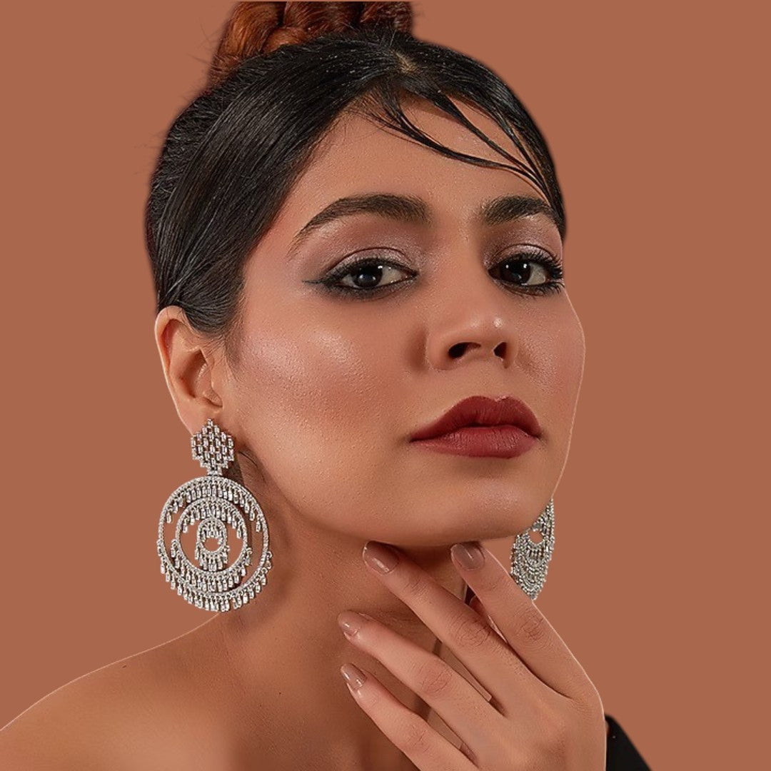 Sparkling crystal concentric circle drop earrings with intricate hanging accents

