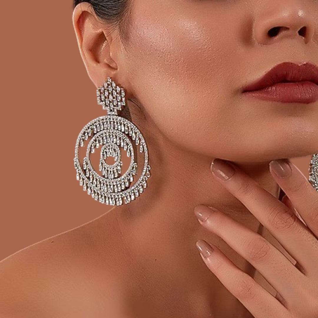 Sparkling crystal concentric circle drop earrings with intricate hanging accents

