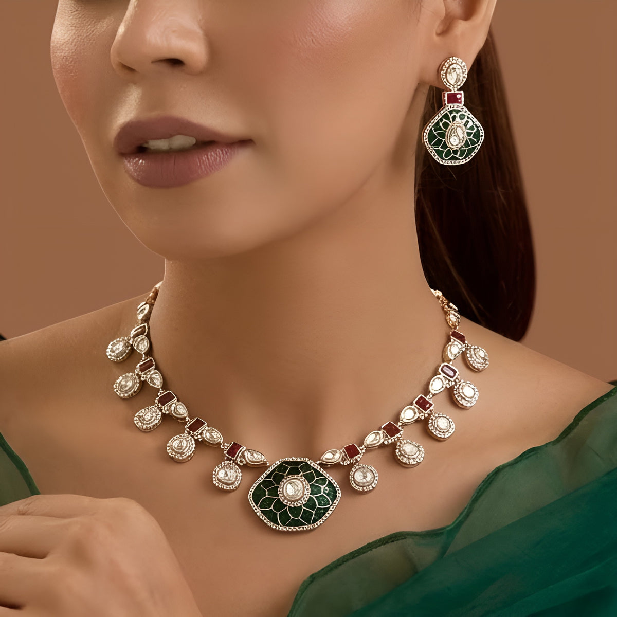 Gold finish kundan choker necklace set with green enamel lotus medallion, ruby red stones, polki-style drops and matching drop earrings – Auraa Trends