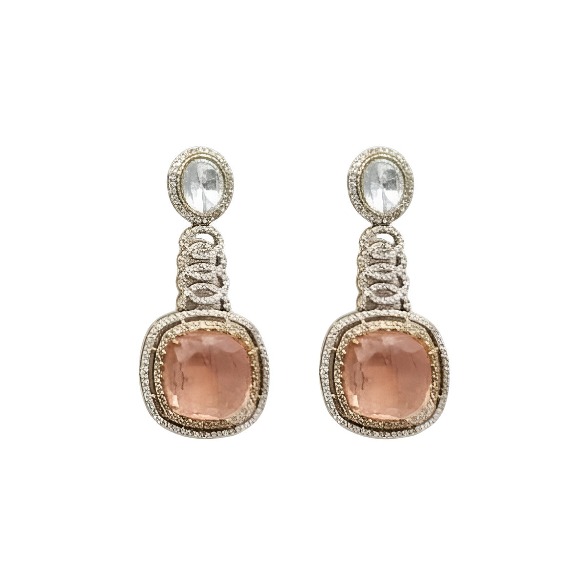 Antique gold Victorian kundan necklace with a large square peach-pink pendant and matching drop earring on a grey display bust