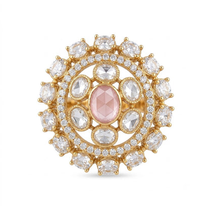 Gold-finish round cocktail ring with a blush-pink oval centre stone, clear oval stones, and American diamond halo