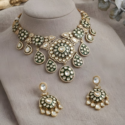 "Antique gold Kundan choker necklace with green meenakari enamel and polki stone medallions, matching disc drop earrings"