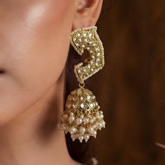 Gold-plated Kundan Jhumka earrings with pearl drops for women, traditional ethnic wedding and festive jewellery.