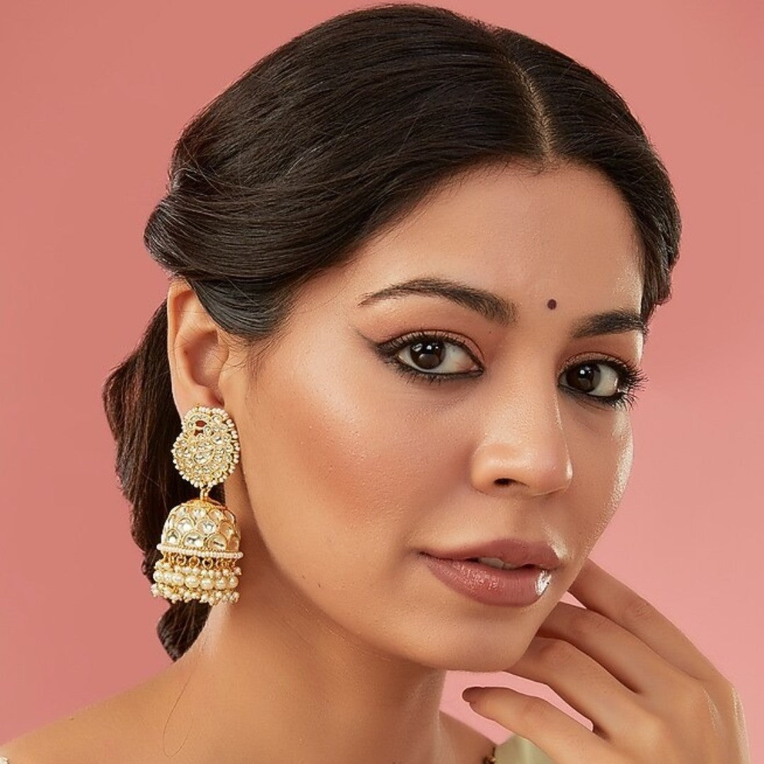 Gold kundan chandbali earrings with pearl beadwork and jhumka-style drops