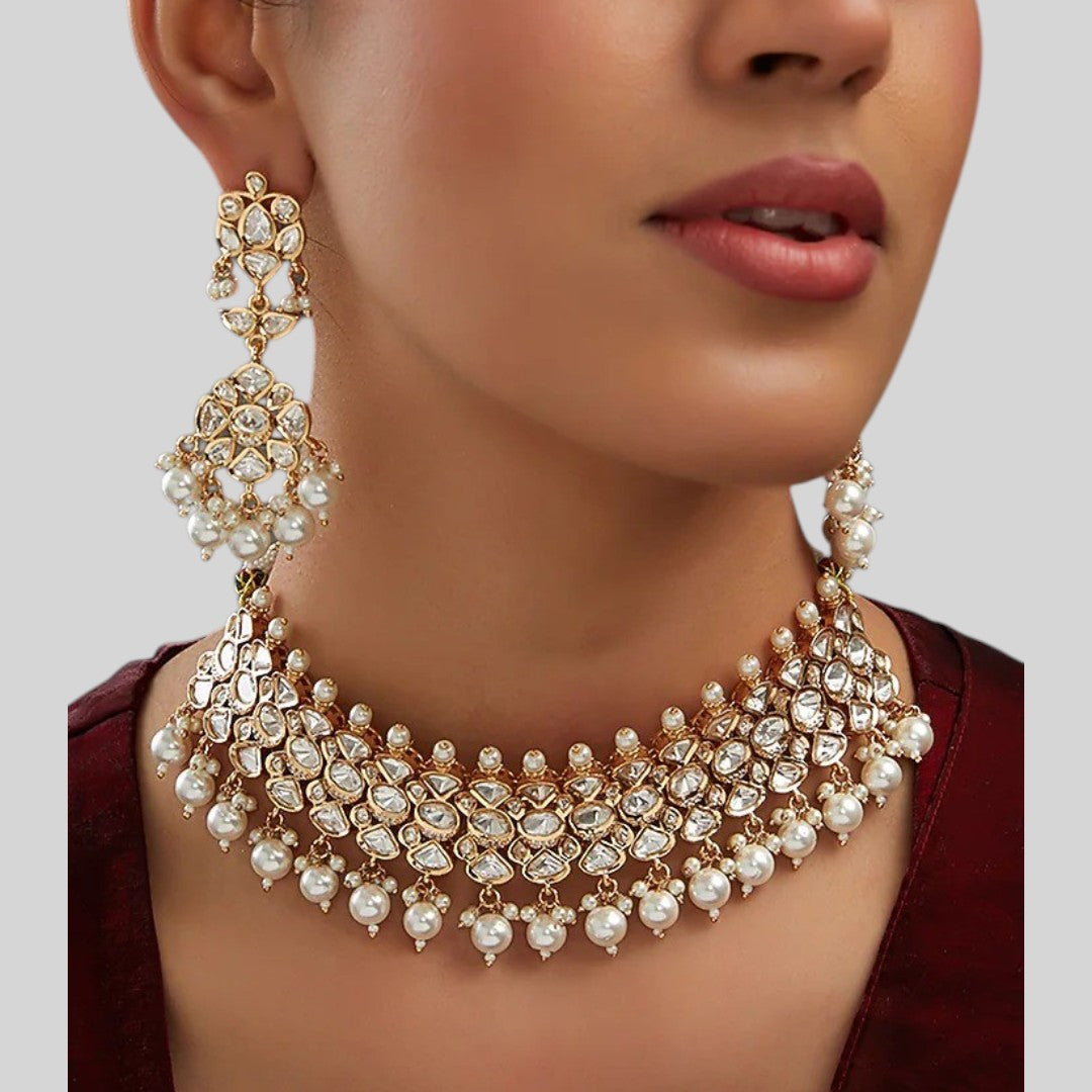 Rose gold polki kundan choker necklace with pearl drops and matching chandelier earrings