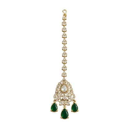 Gold triangle maang tikka with clear kundan stones and emerald green teardrop drops, Indian bridal hair jewelry on white background