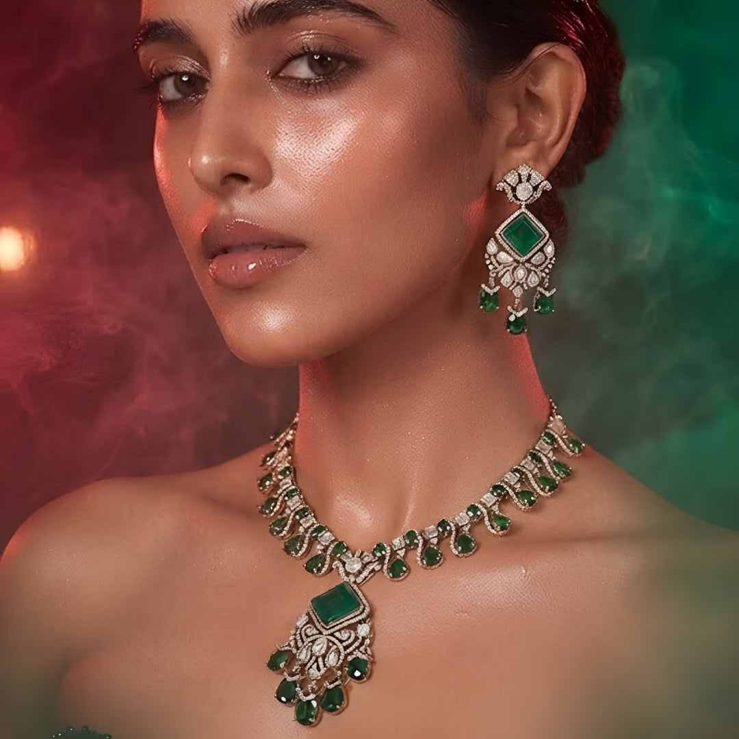 "Antique gold Kundan necklace with square-cut emerald pendant and teardrop drops, matching drop earrings"