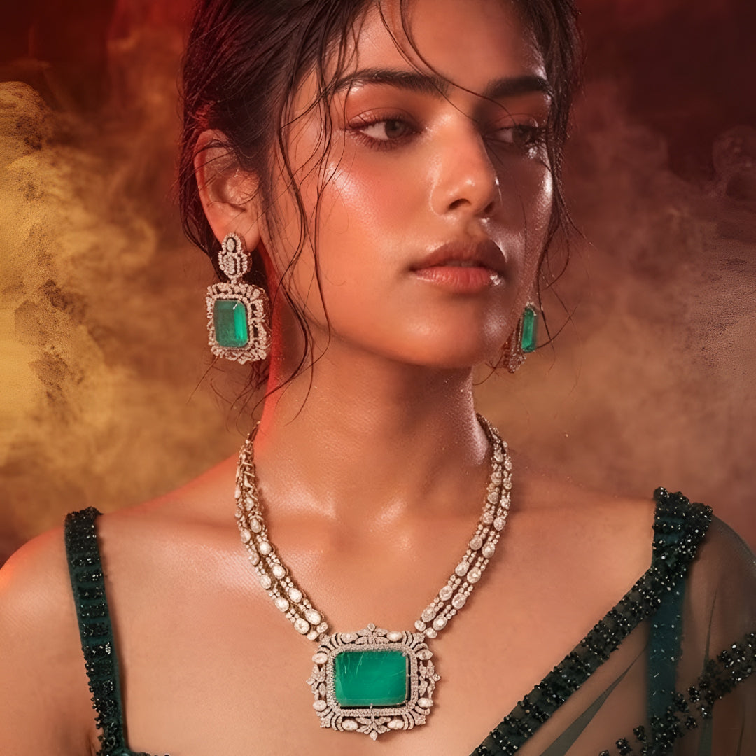 "Antique gold double-strand necklace with large emerald-cut pendant and polki stone detailing, matching drop earrings"