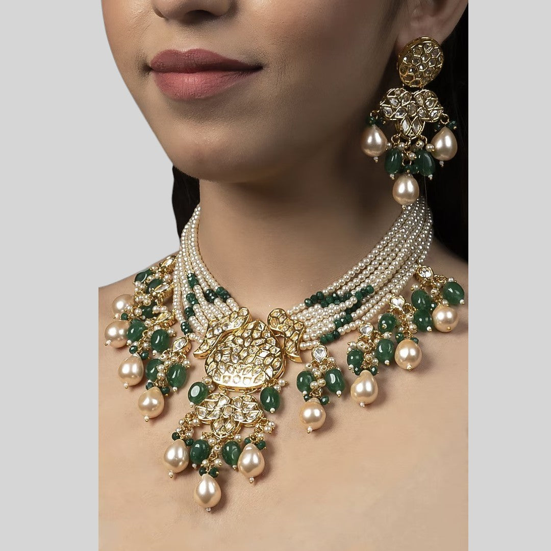 Multi-strand pearl and emerald green beaded choker necklace set with polki pendant and matching chandbali earrings