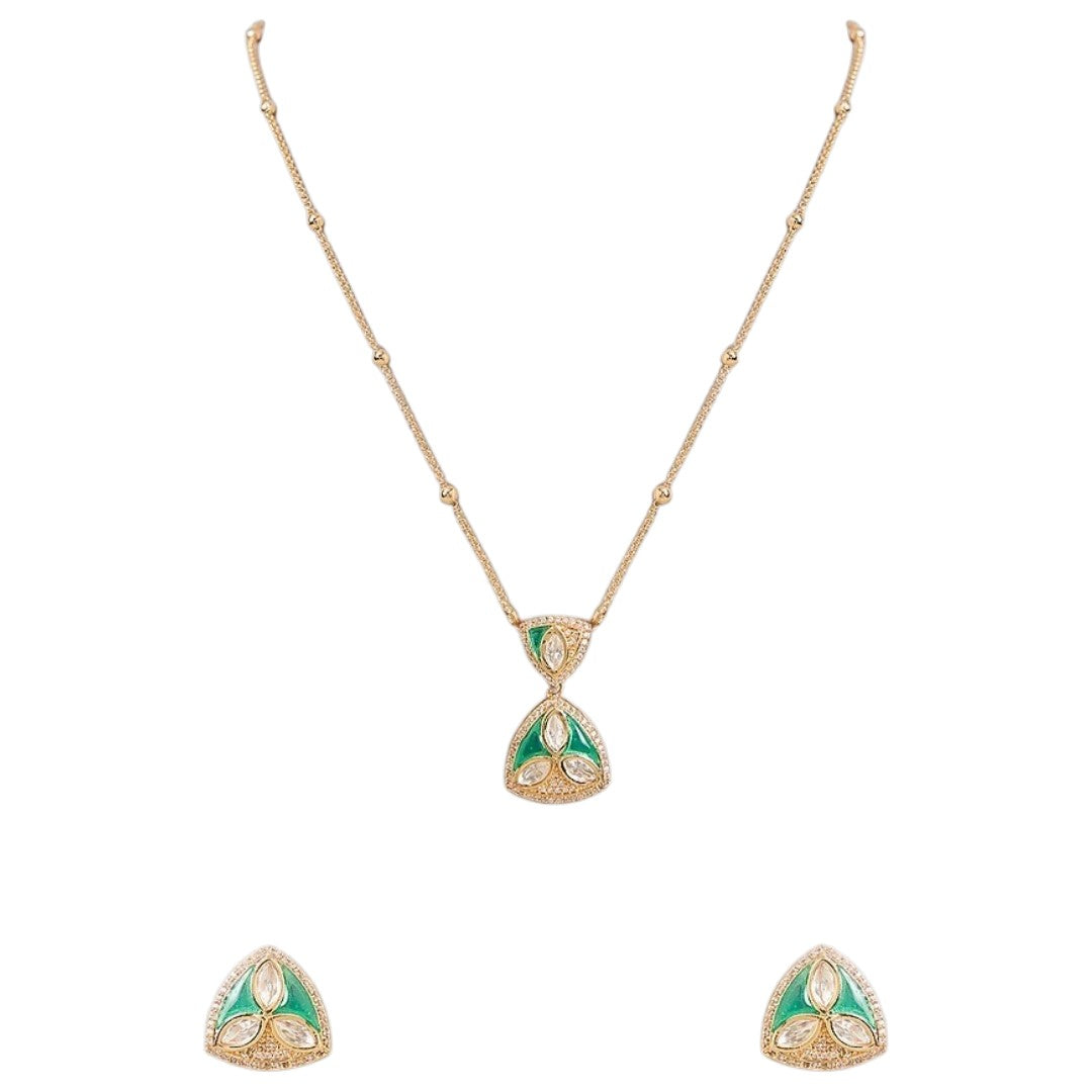 "Gold-tone triangular pendant necklace and earring set with green enamel detailing and marquise-cut clear crystal accents, on white background"