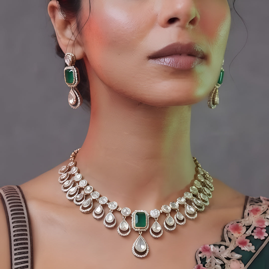 Green kundan necklace set with emerald stone, pear-shaped kundan drops and matching earrings