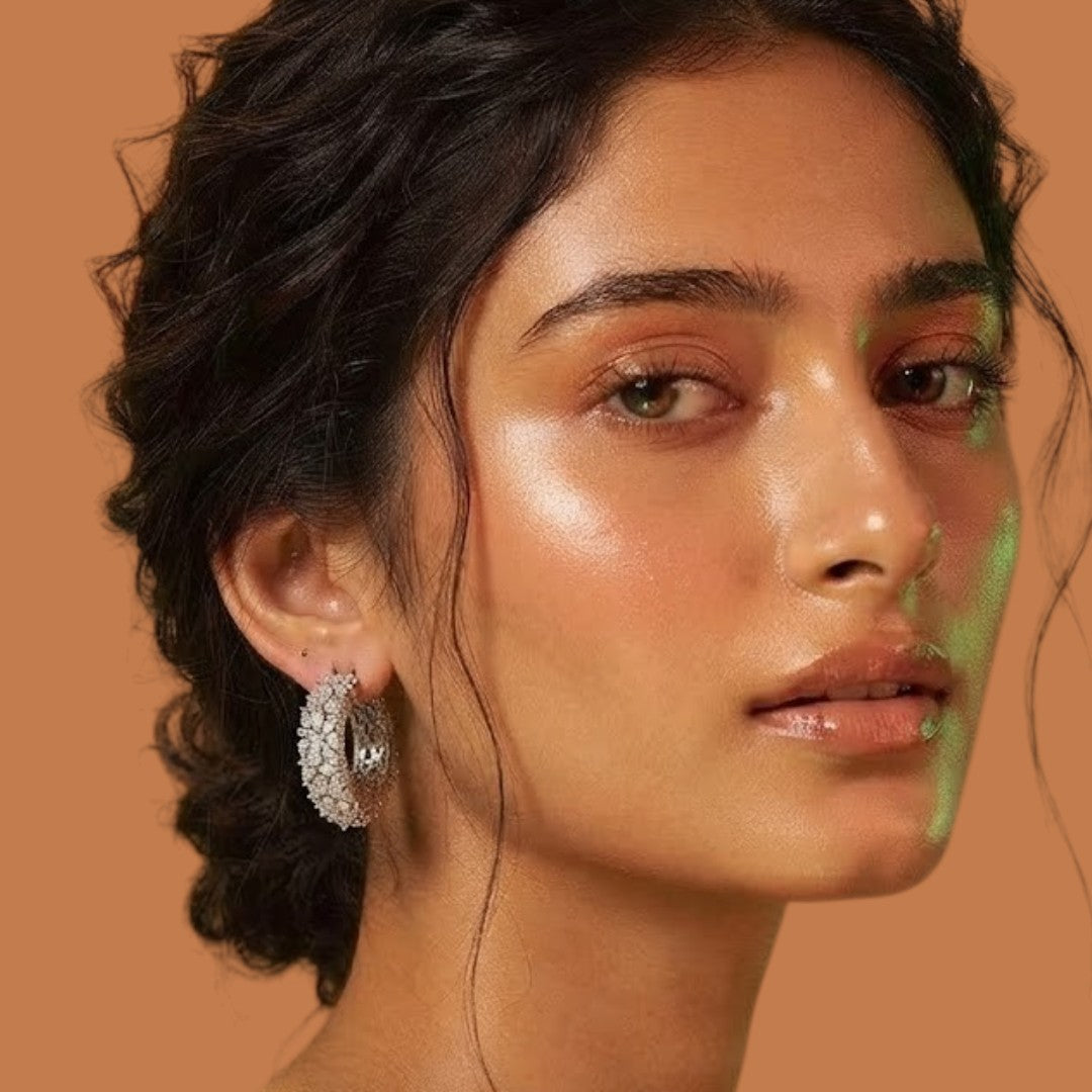 Rhodium-plated American diamond huggie hoop earrings with pear and marquise cut zircon stones and pavé edge