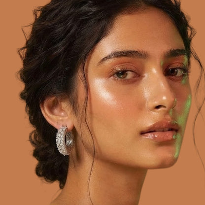 Rhodium-plated American diamond huggie hoop earrings with pear and marquise cut zircon stones and pavé edge