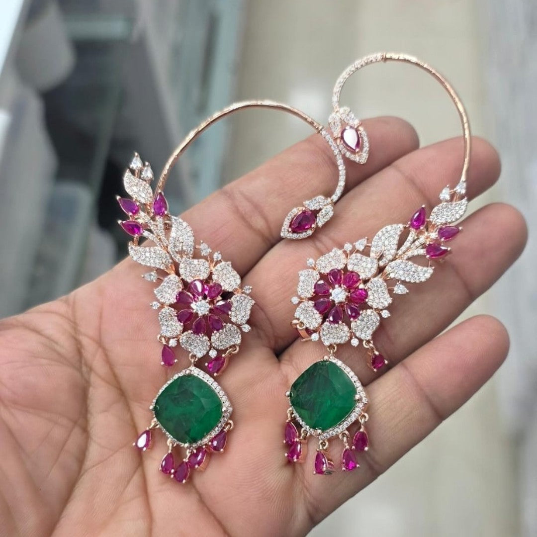 Rose gold American diamond ear cuff earrings with ruby pink pear stones, pavé floral design and emerald green cushion-cut drop