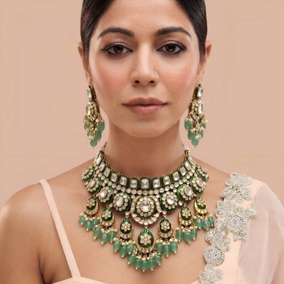 Gold-finish green meenakari kundan polki bridal choker necklace set with mint green bead drops and matching chandelier earrings