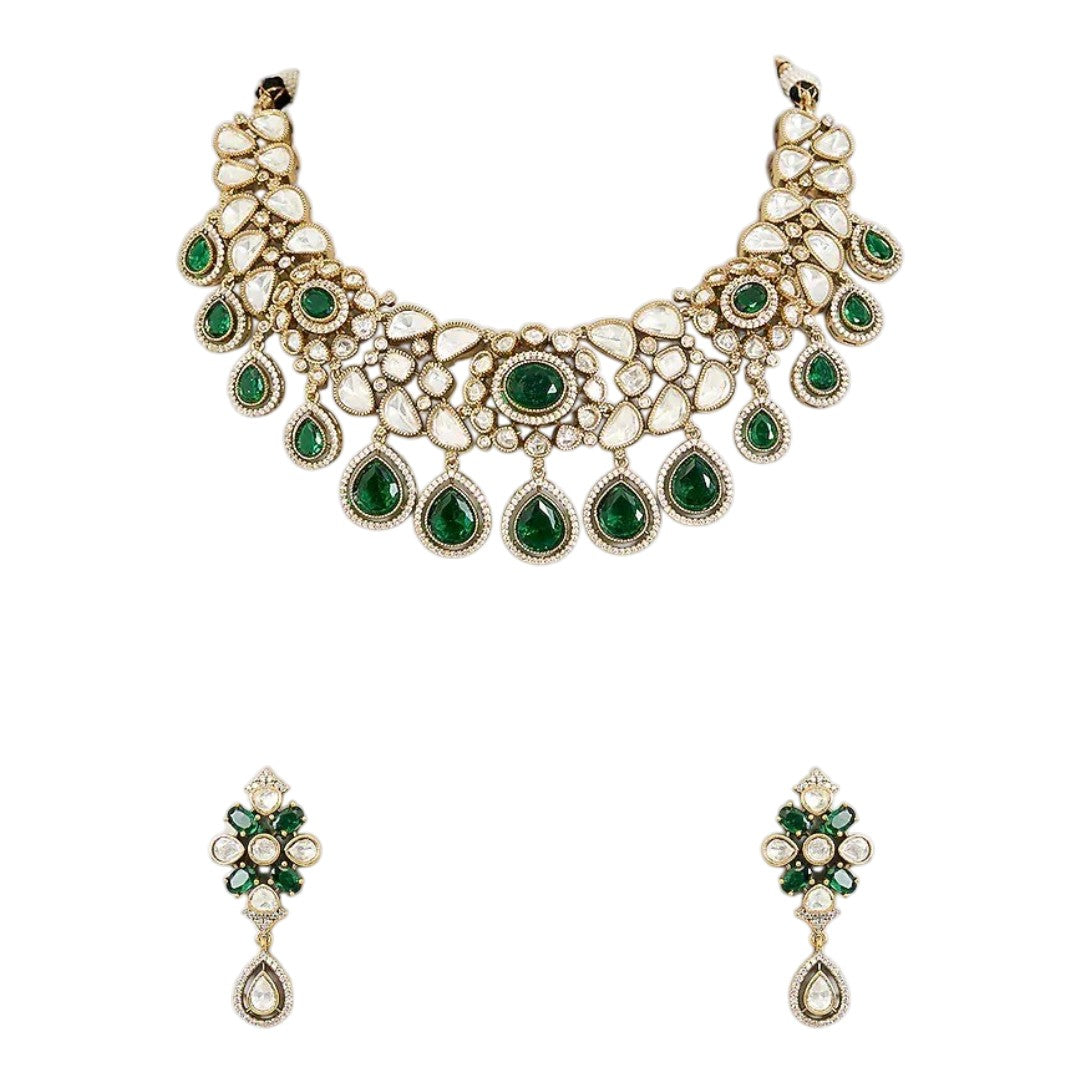 "Gold-tone Kundan choker necklace set with emerald green teardrop drops and matching earrings"