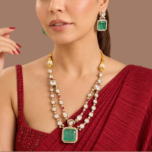 Antique gold kundan polki double strand necklace set with carved emerald green square pendant and matching earrings by Auraa Trends