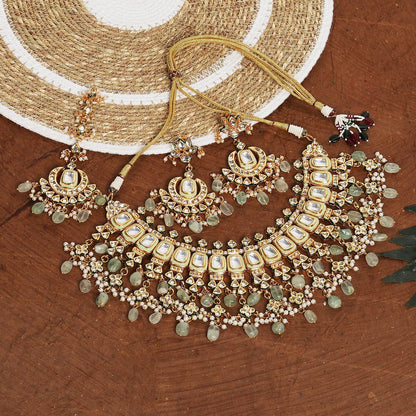 Enchanting Gold Plated Kundan Necklace Set With Maangtika