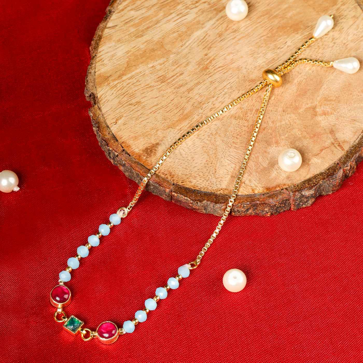 Opalescent Gold Plated Kundan Rakhi Bracelet
