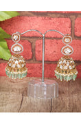 Load image into Gallery viewer, Ornate Gold Plated Kundan Jhumka Earrings
