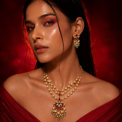 Layered pearl necklace with Kundan ruby pendant, gold-plated bridal jewellery