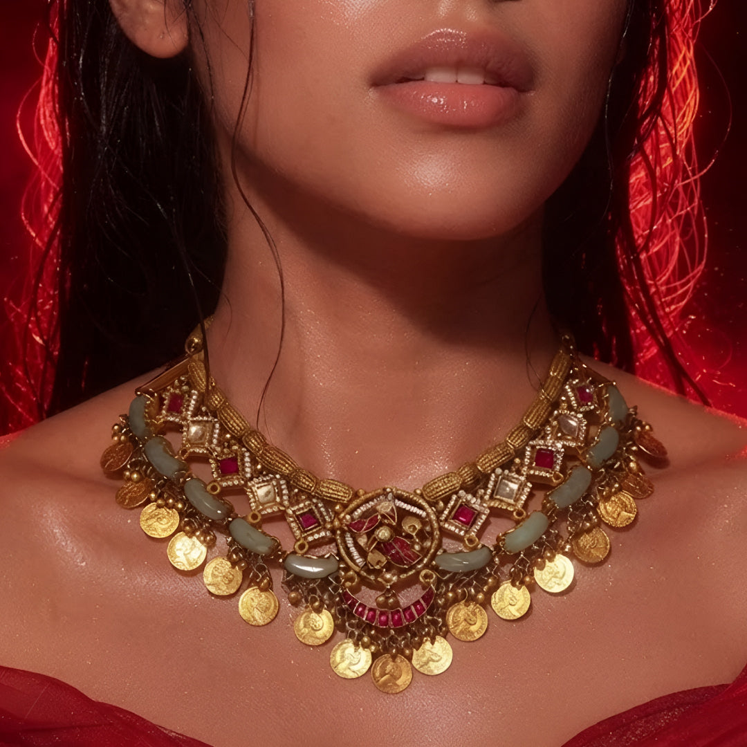 "Antique gold coin necklace set with kemp stones, green beads, and matching jhumka earrings, South Indian temple jewellery"