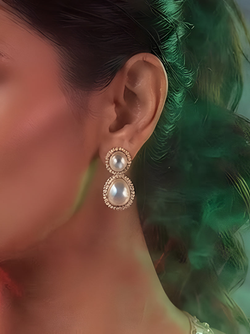 "Gold-plated iridescent double cushion cut crystal drop earrings with CZ halo border, statement party wear earrings on white background"