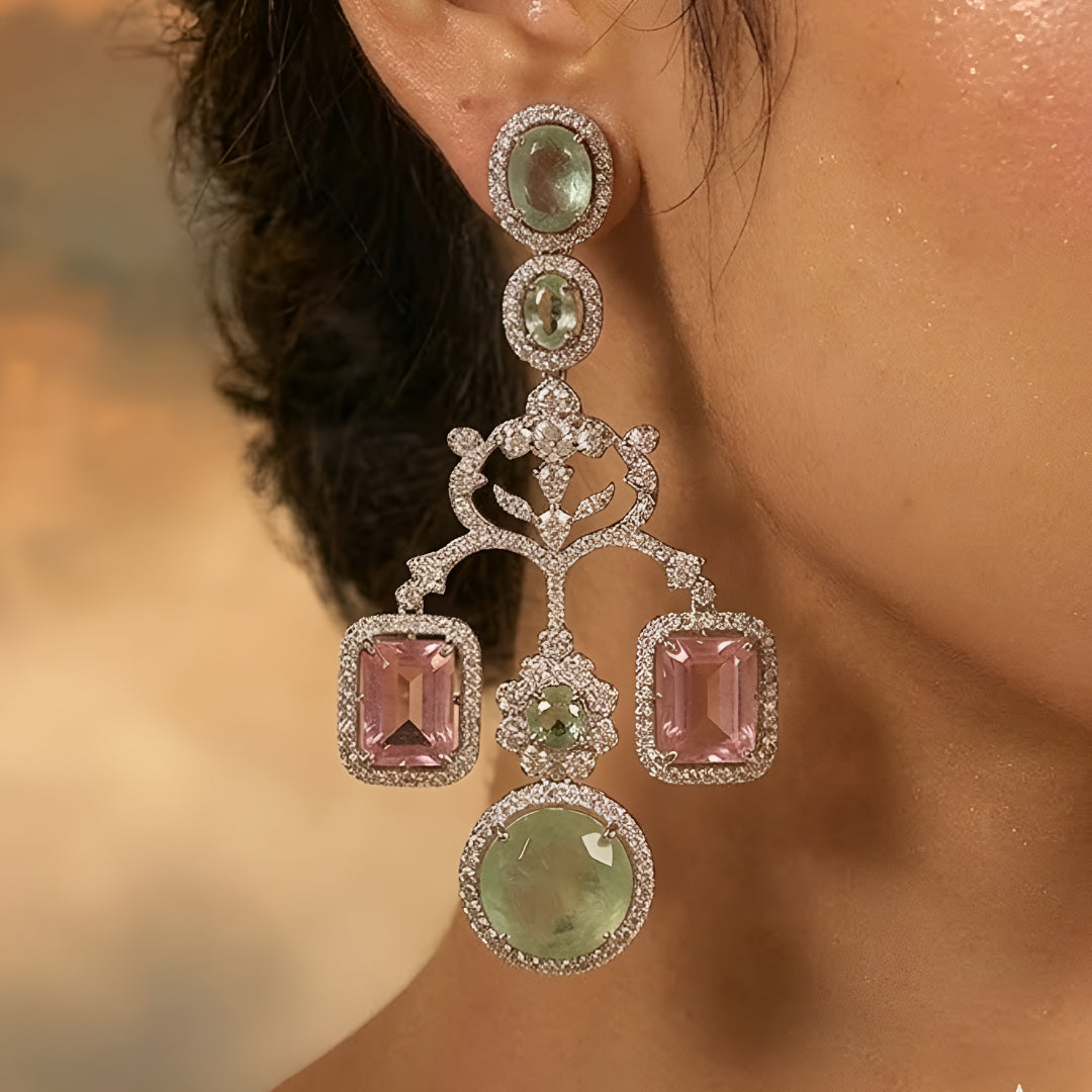 Luxury gold plated pastel green and pink stone statement earrings with American diamonds for women, designer wedding and party wear jewelry.