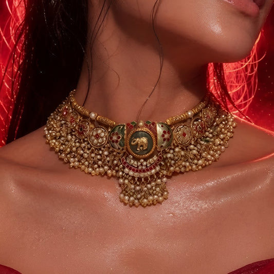 "Antique gold meenakari choker necklace set with elephant motif and matching pearl jhumka earrings, traditional bridal jewellery"