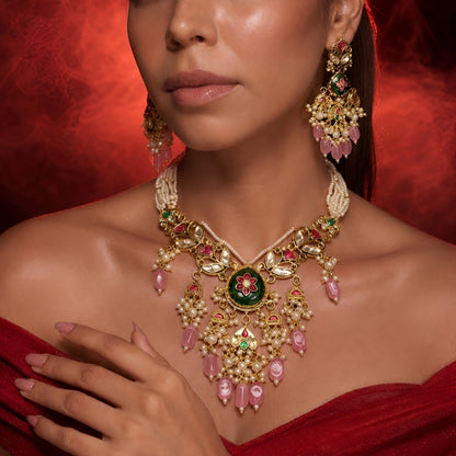 "Antique gold floral meenakari necklace with matching chandbali earrings"