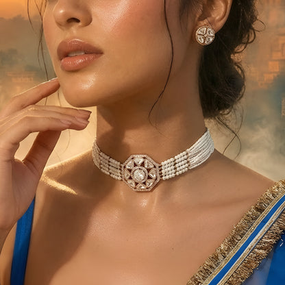 Elegant pearl kundan choker necklace set with matching stud earrings featuring gold-tone finish and traditional ethnic design for women.