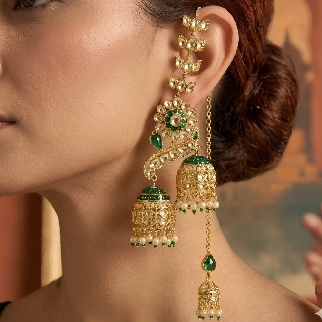 Gold-plated green Kundan peacock jhumka earrings with ear chain and double jhumka drops for bridal wear