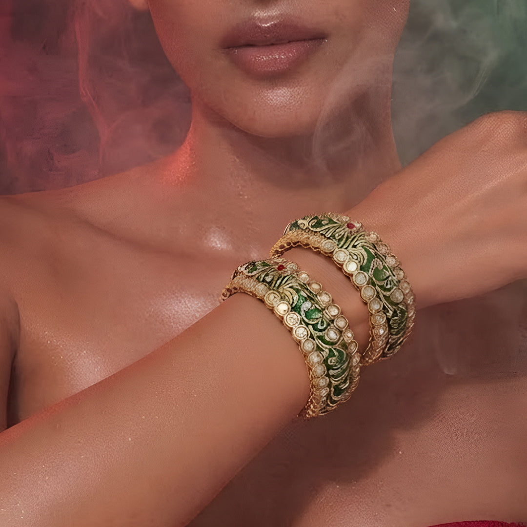 Green Meenakari-inspired AD studded gold tone designer bangle set with floral detailing