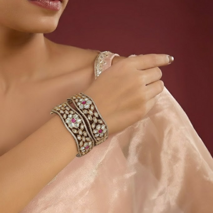 Gold-plated Kundan bangles with ruby pink stones and floral design for women
