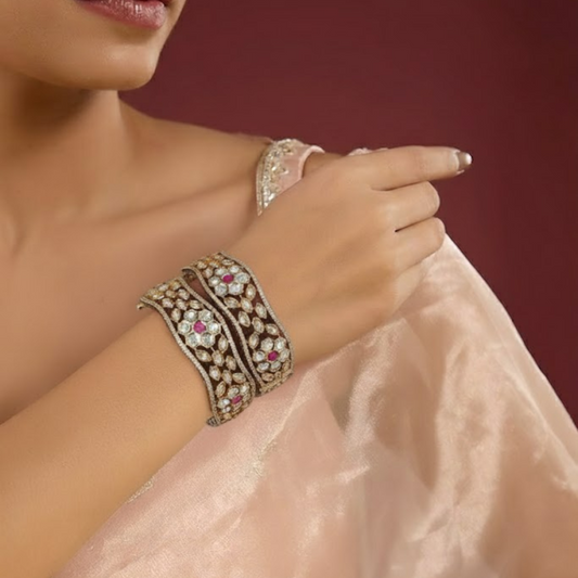 Gold-plated Kundan bangles with ruby pink stones and floral design for women