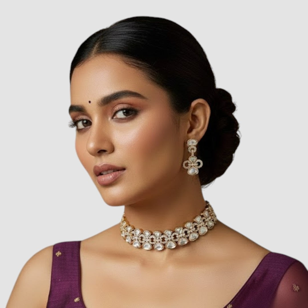 "Gold-plated Kundan necklace set with teardrop stones and matching earrings for women"