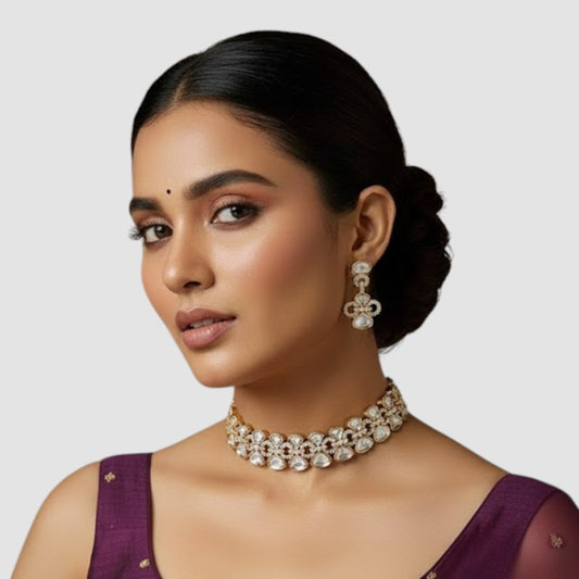 "Gold-plated Kundan necklace set with teardrop stones and matching earrings for women"