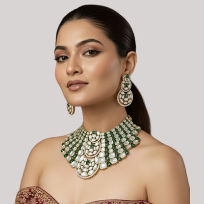 “Bridal Kundan choker necklace set with green emerald stones and matching earrings – Polki wedding jewelry