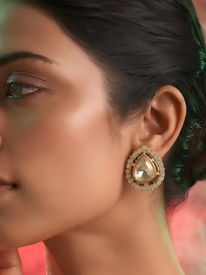 Shop elegant gold-plated polki stud earrings with rose-cut crystal center and CZ halo. Perfect minimal earrings for daily & festive wear. Buy now!
