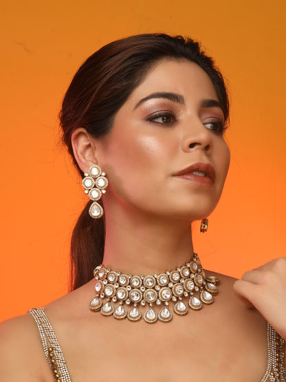 Gold-plated Kundan choker necklace set with teardrop stones and matching earrings for bridal and wedding wear