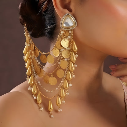 Gold plated Polki ear cuff chain earrings with layered coin charms, tassel drops and pearl accents for bridal and wedding wear.