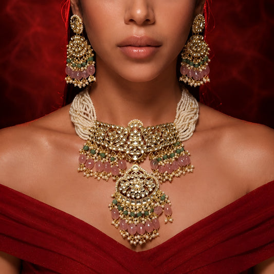 "Antique gold floral kundan choker with matching chandbali earrings"