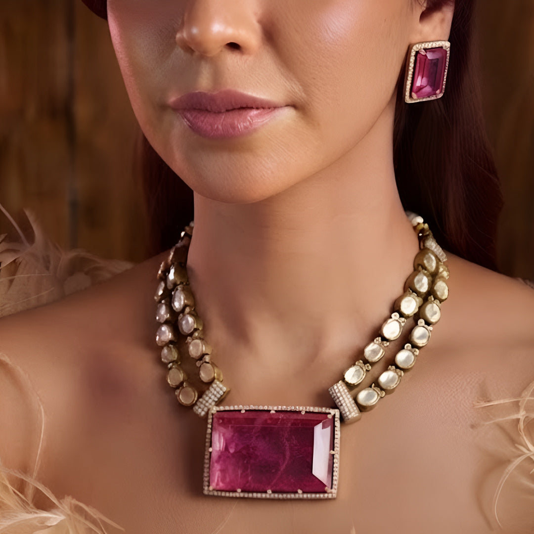 Pink crystal pendant necklace set with matching rectangular earrings in gold plating by Auraa Trends