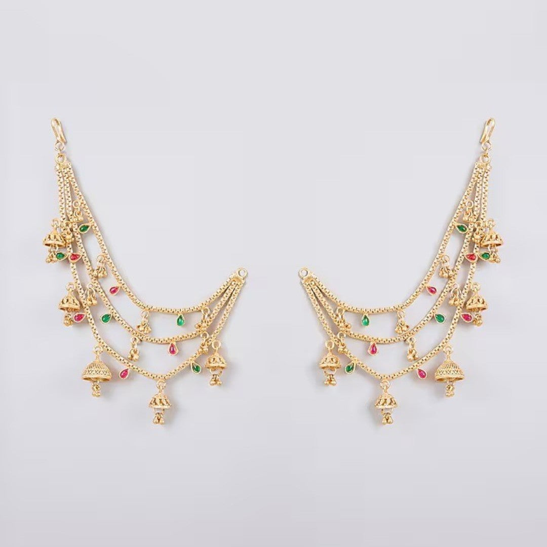 Traditional gold plated multilayer Kaan Chain with jhumka charms and red green stone detailing for women, perfect for bridal, wedding, festive, and ethnic wear.