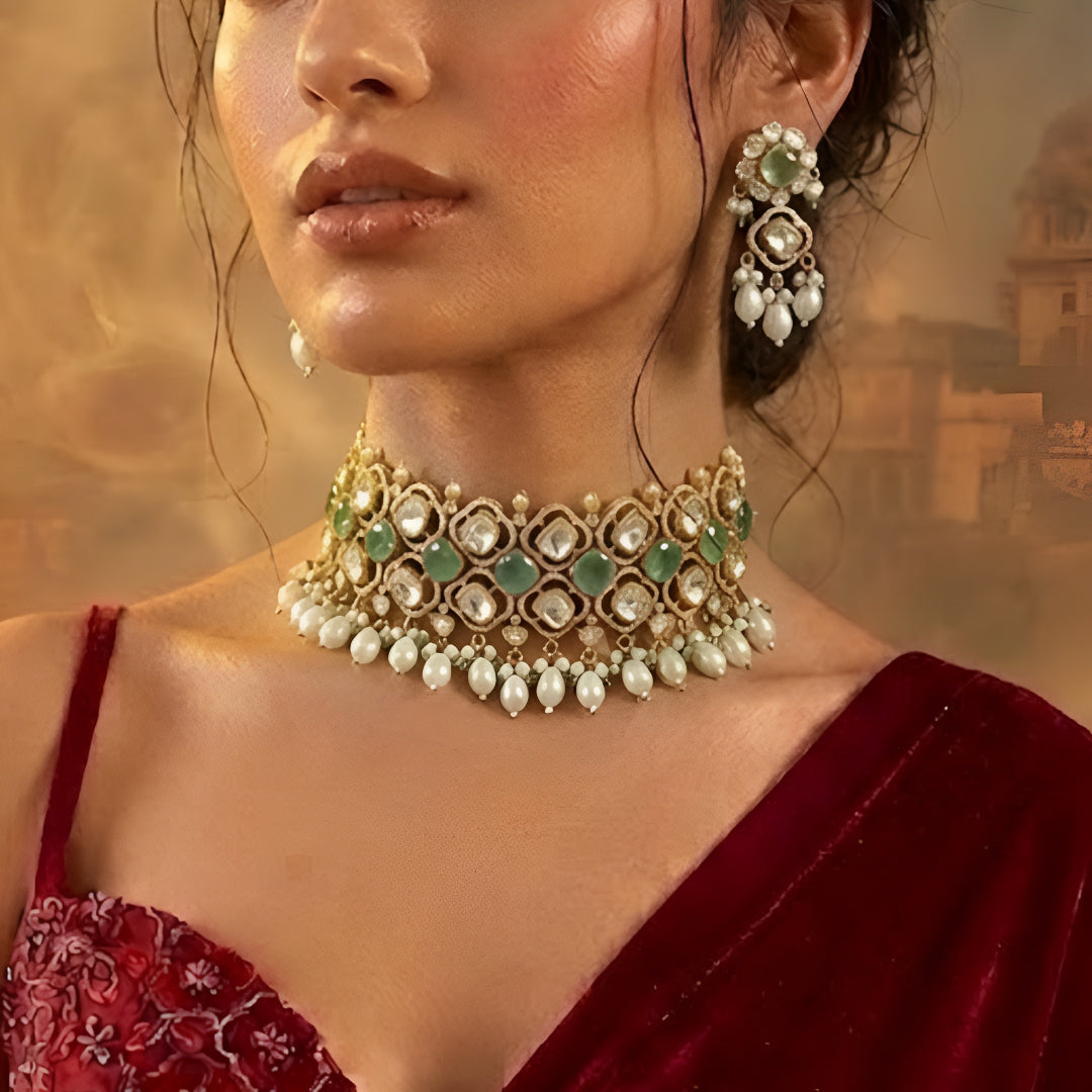 Mint green Kundan pearl choker necklace set with matching dangling earrings in gold plating by Auraa Trends