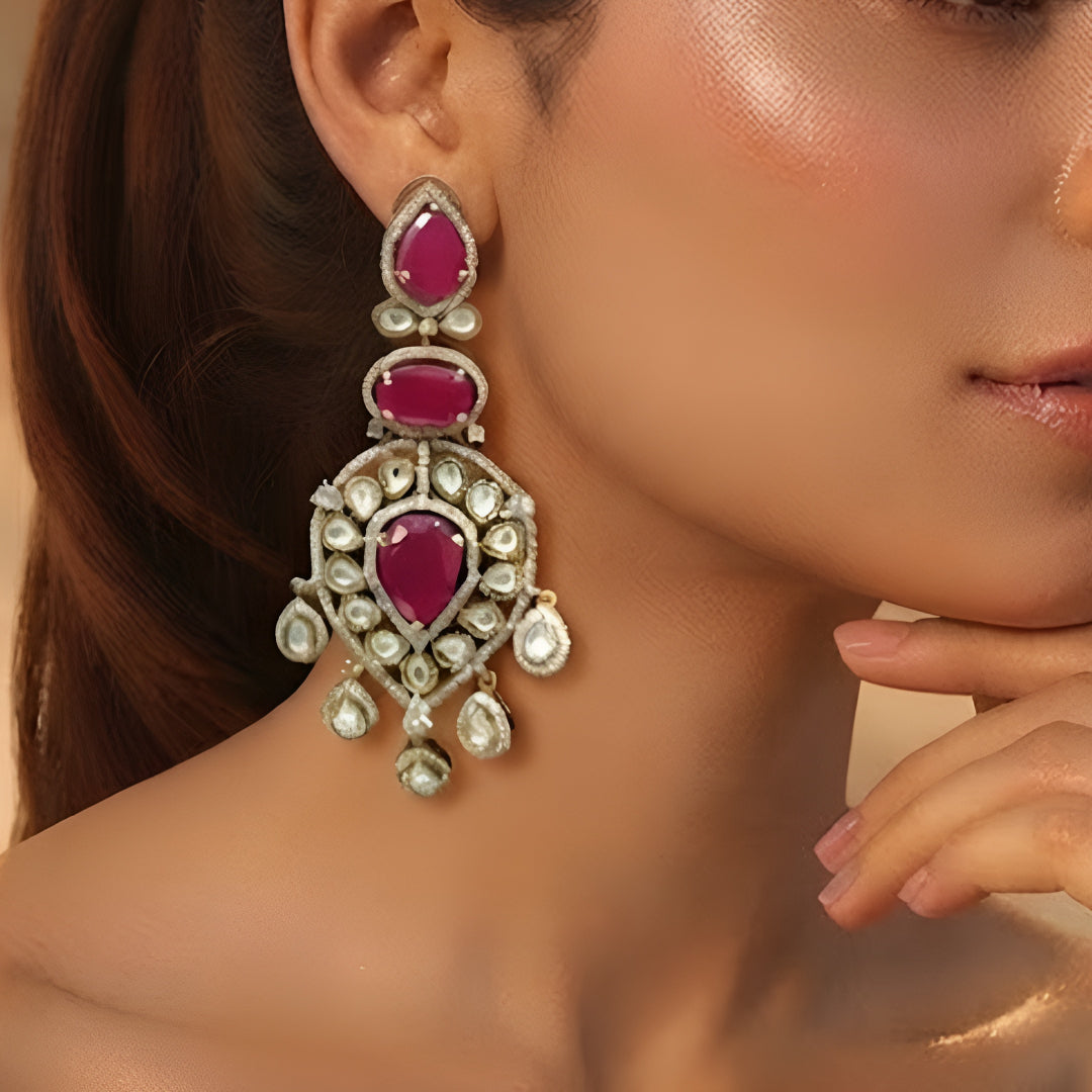 Ruby red stone and Polki gold plated chandelier earrings for women, bridal wedding statement ethnic jewelry with dangling drops.