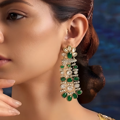 Luxury gold-plated chandelier earrings featuring emerald green oval stones and sparkling American diamonds for women.