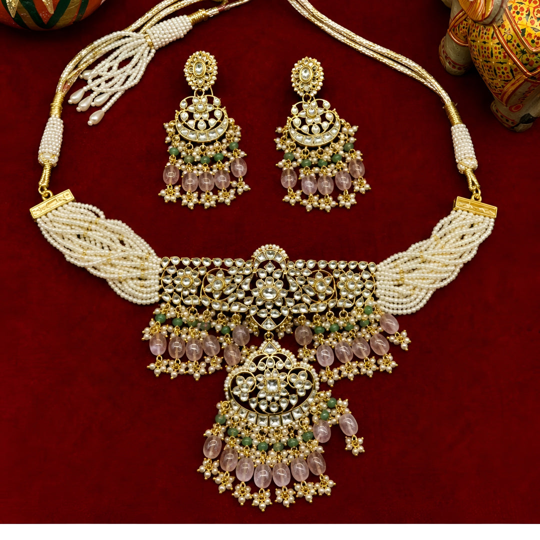 "Antique gold floral kundan choker with matching chandbali earrings"